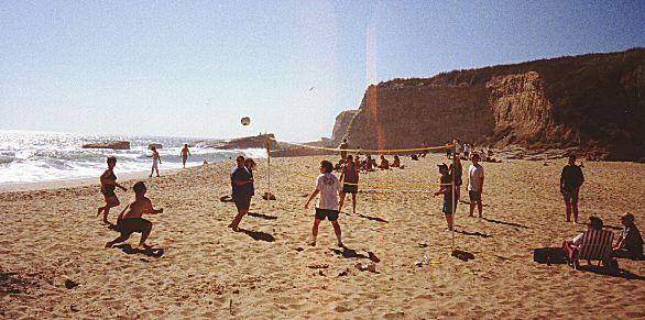 Playing volleyball on the beach